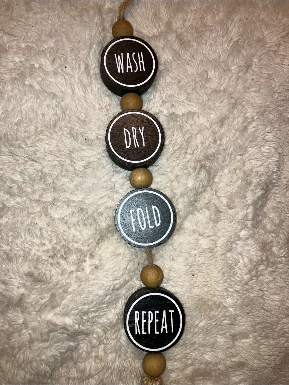 Neutral Brown 'Wash Dry Fold Repeat' Hanging Wall Decor